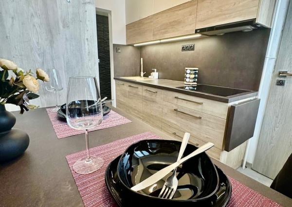 Gabčíkovo - predaj 3 izb. bytu + pozemok a garáž v uzamknutom dvore v centre mesta.